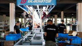Production line under a Gladiator sign